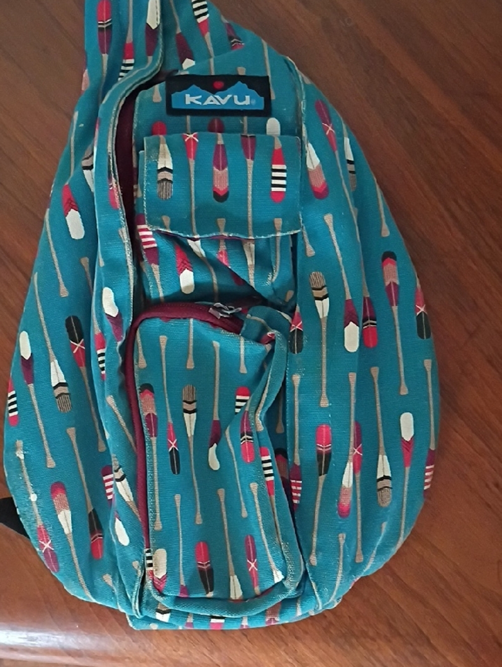 Kavu Teal Sling Bag with Red Dot Logo